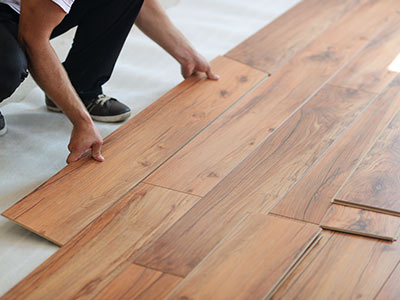 Commercial flooring installation LVT and laminate in office